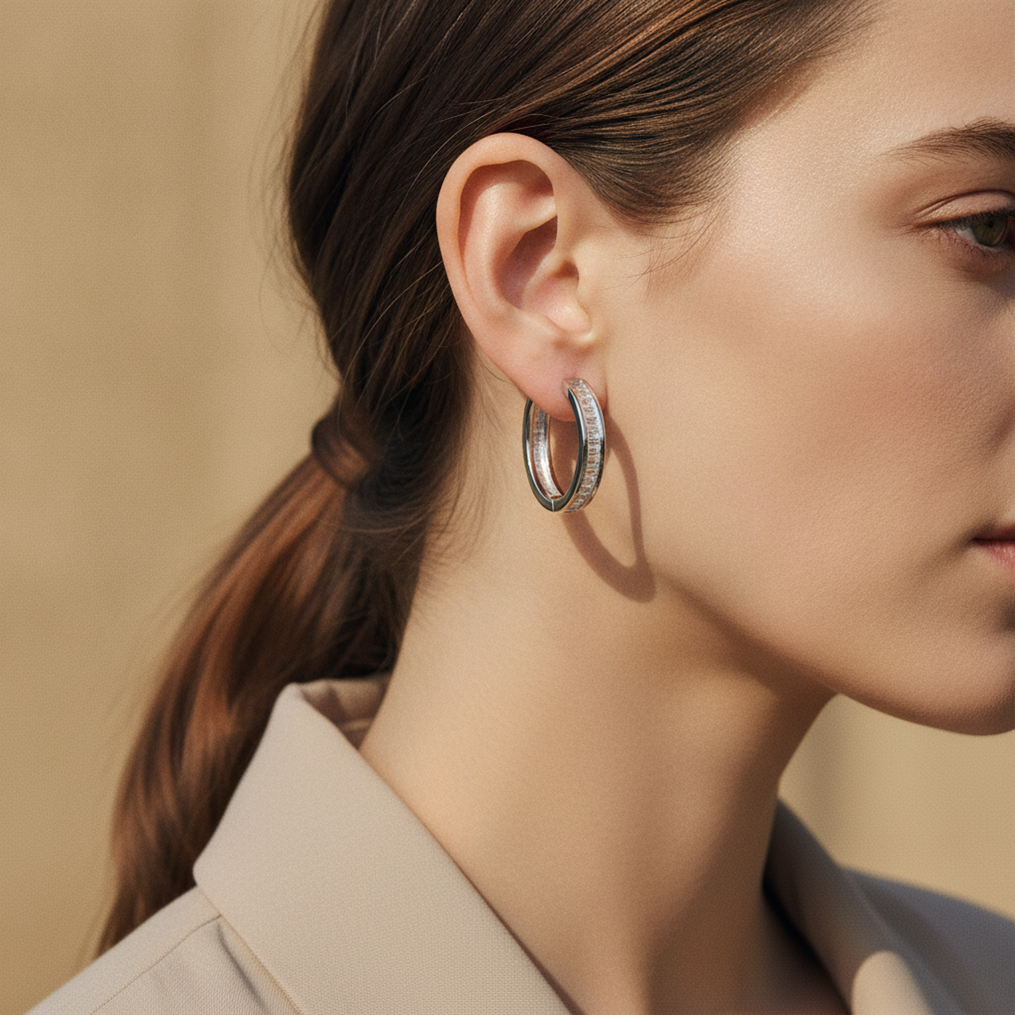 Emerald Hoop Earrings on ear