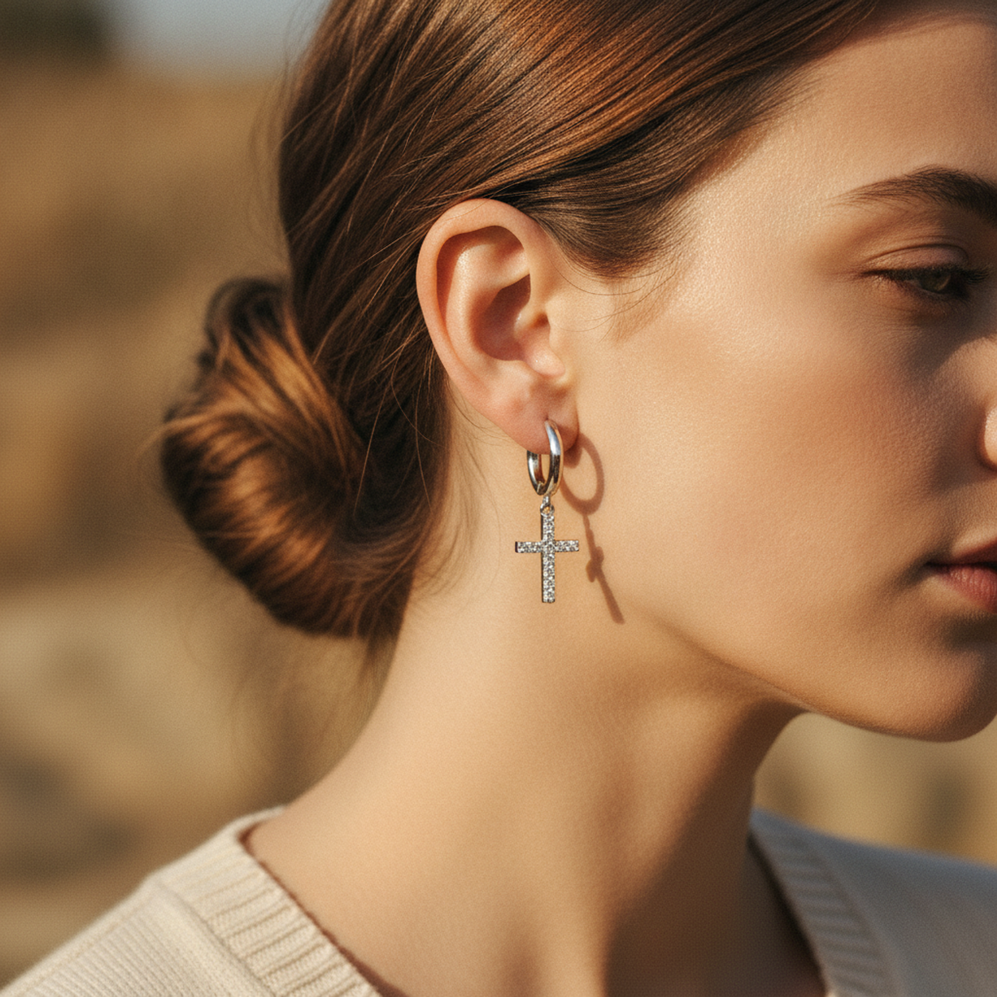 Cross Drop Hoops on ear